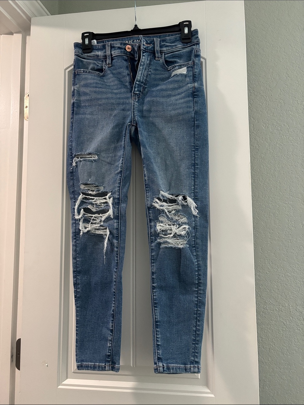 American Eagle Outfitters Ripped Light Blue Super High-Waisted Jegging Jeans